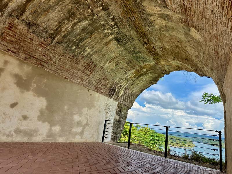 view from beneath rounded arch