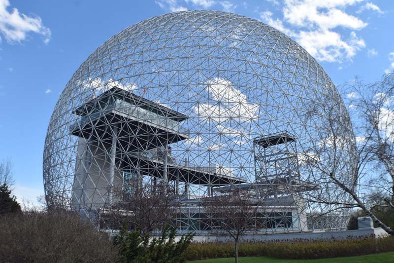 transparent dome with building in background