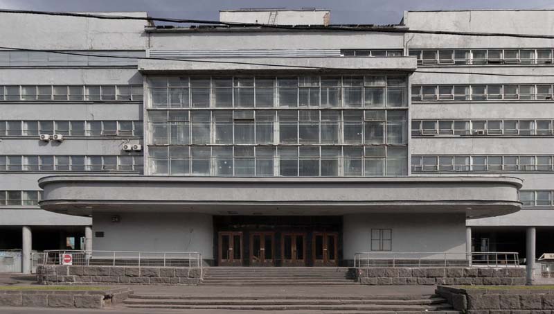 entrance to white concrete building