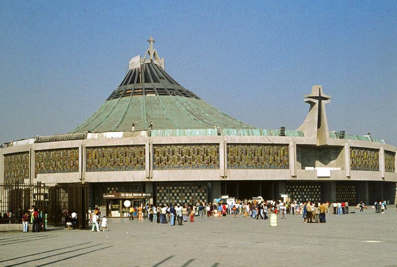 round church building with sloped roof