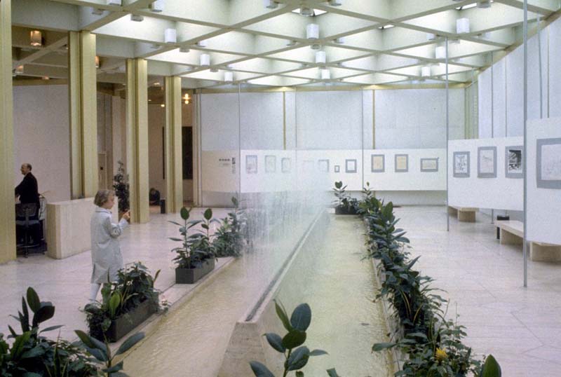 modern white interior with rectangular fountain