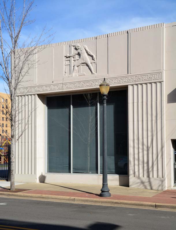 stone building facade along street